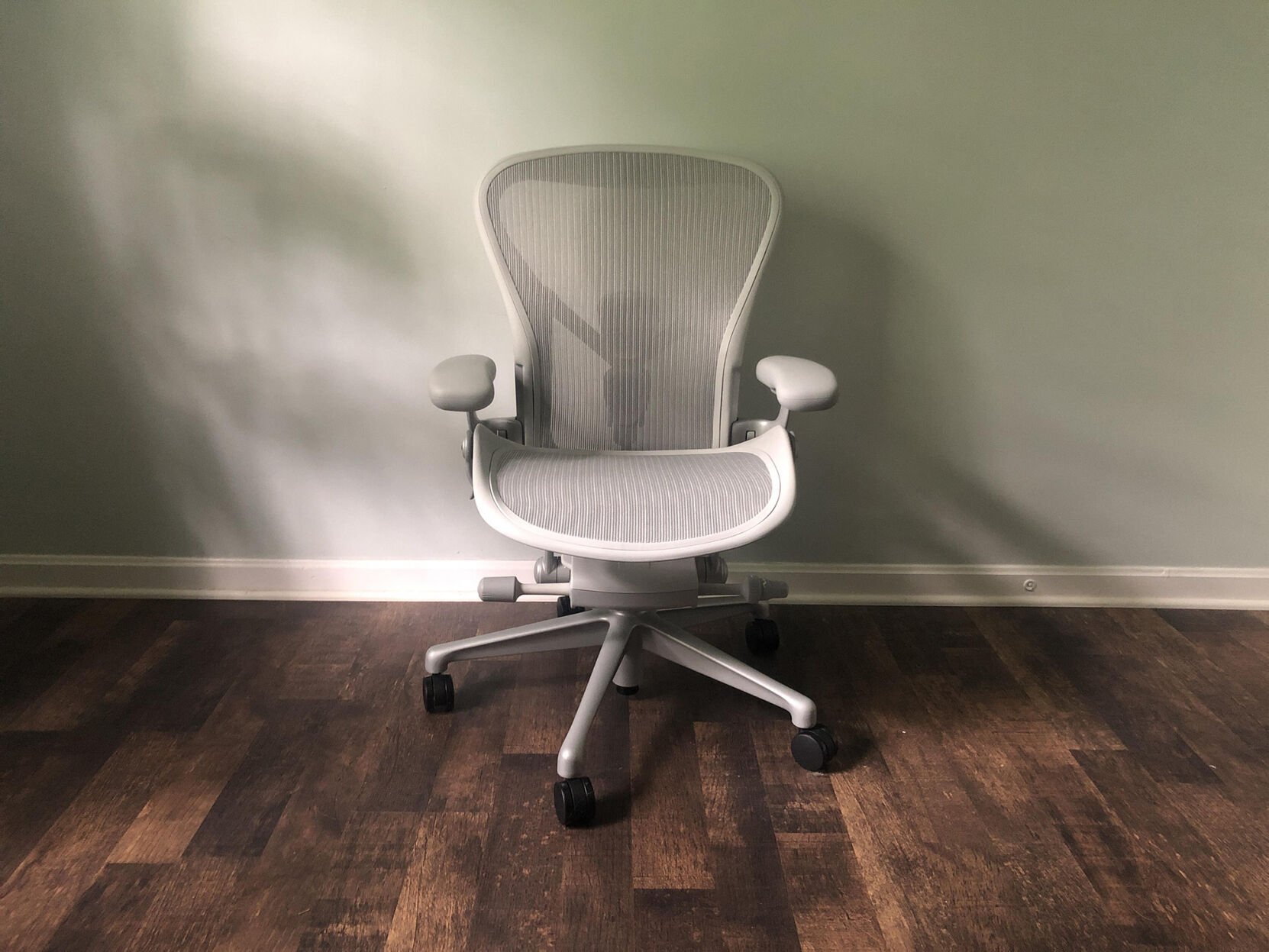 Herman Miller Aeron Chair has lots of adjustability, lumbar support and, it comes in three sizes.
